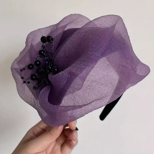 Purple people fascinator